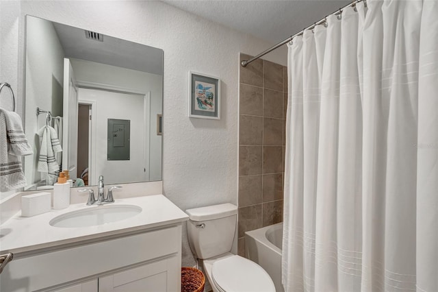 14267 Heritage Landing Blvd Unit 1223, Punta Gorda, FL 33955 - full bathroom with a textured wall, toilet, vanity, electric panel, and shower / bath combo