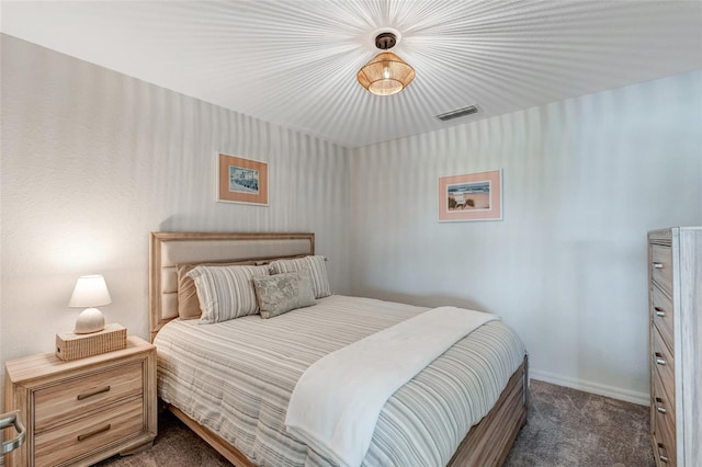 14267 Heritage Landing Blvd Unit 1223, Punta Gorda, FL 33955 - bedroom with dark carpet and baseboards