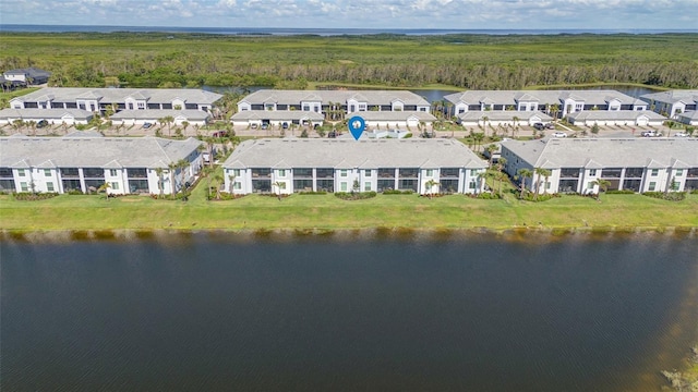 14267 Heritage Landing Blvd Unit 1223, Punta Gorda, FL 33955 - aerial view of residential area featuring a large body of water and a heavily wooded area