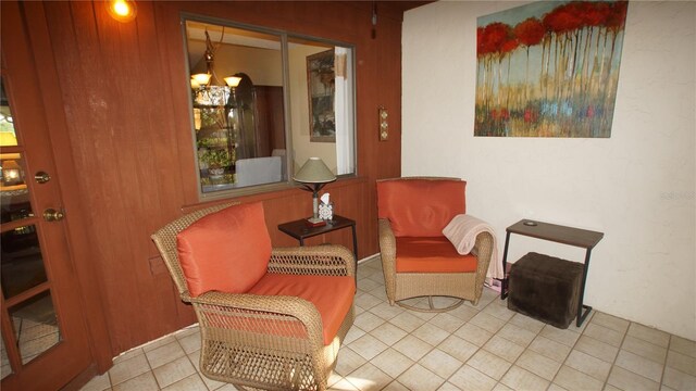 925 Fenton Ln Unit 11, Lakeland, FL 33809 - living area featuring a chandelier and tile patterned flooring