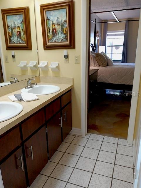 925 Fenton Ln Unit 11, Lakeland, FL 33809 - ensuite bathroom with tile patterned flooring and double vanity