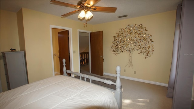 925 Fenton Ln Unit 11, Lakeland, FL 33809 - carpeted bedroom with ceiling fan and baseboards
