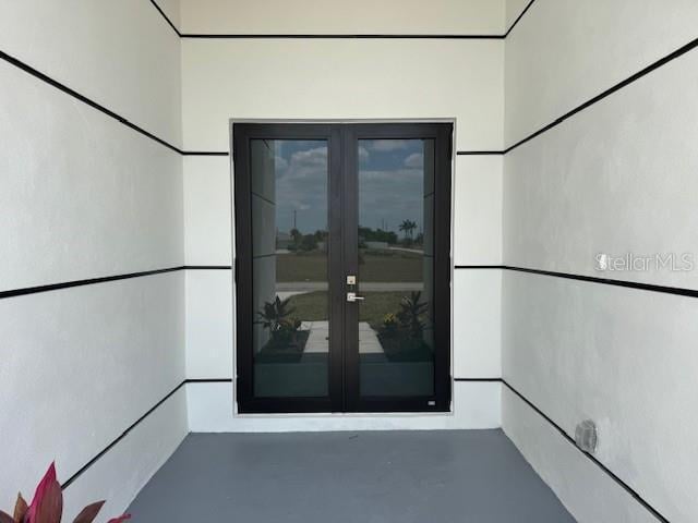 doorway to property with french doors