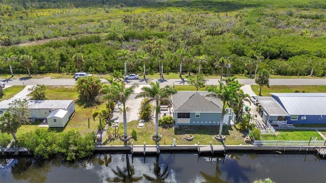 4231 Hollis Ave, Port Charlotte, FL 33953 - view of subject property with a heavily wooded area and a nearby body of water