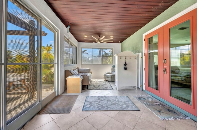 4231 Hollis Ave, Port Charlotte, FL 33953 - sunroom / solarium with french doors, wooden ceiling, and tile patterned flooring