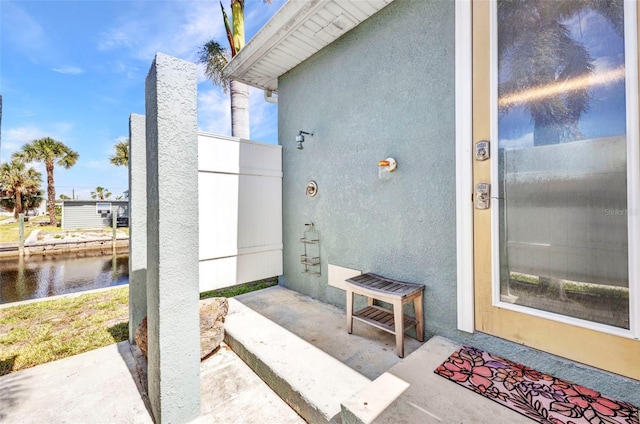 4231 Hollis Ave, Port Charlotte, FL 33953 - view of patio featuring a water view