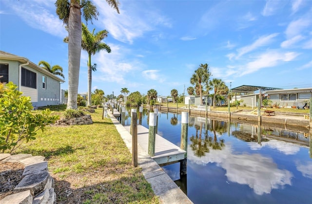 4231 Hollis Ave, Port Charlotte, FL 33953 - dock area featuring a water view and a yard