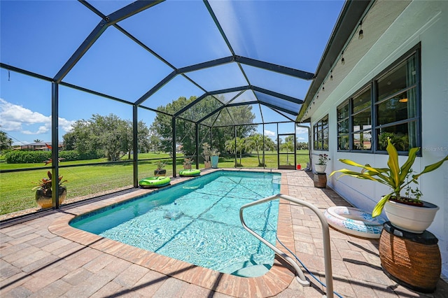 16615 Acapulco Rd, Punta Gorda, FL 33955 - swimming pool featuring a patio, a lawn, and a lanai