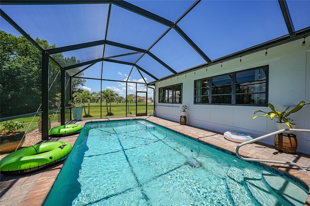 16615 Acapulco Rd, Punta Gorda, FL 33955 - swimming pool featuring glass enclosure and a patio area