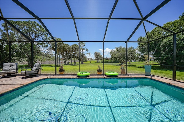 16615 Acapulco Rd, Punta Gorda, FL 33955 - swimming pool featuring a patio area, a yard, and glass enclosure