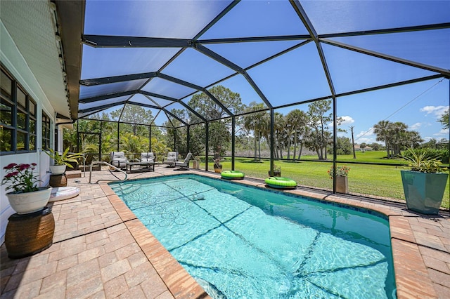 16615 Acapulco Rd, Punta Gorda, FL 33955 - outdoor pool with a patio area, a yard, glass enclosure, and an outdoor hangout area