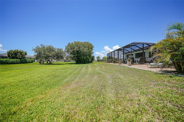16615 Acapulco Rd, Punta Gorda, FL 33955 - view of green lawn with a patio area and glass enclosure