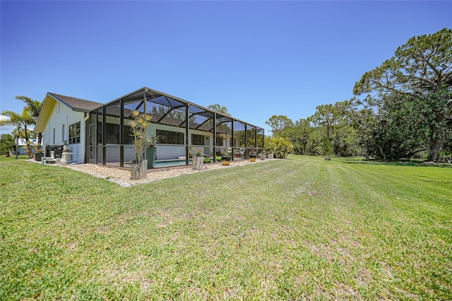 16615 Acapulco Rd, Punta Gorda, FL 33955 - view of green lawn with an outdoor pool