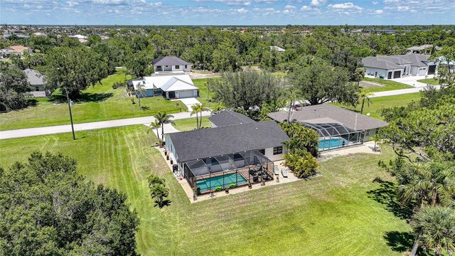 16615 Acapulco Rd, Punta Gorda, FL 33955 - aerial perspective of suburban area featuring a pool