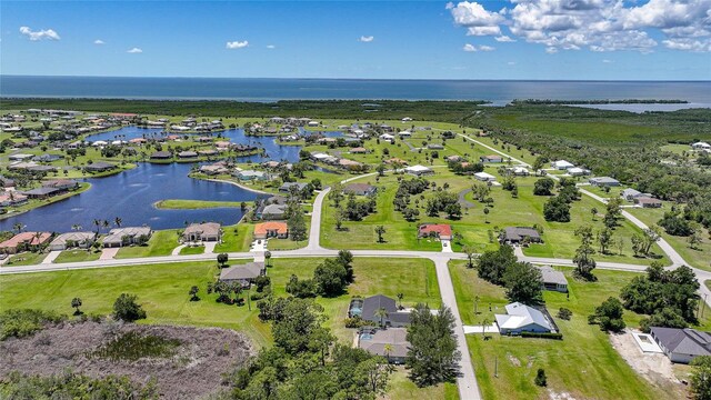 16615 Acapulco Rd, Punta Gorda, FL 33955 - aerial perspective of suburban area with a large body of water