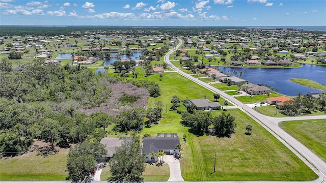 16615 Acapulco Rd, Punta Gorda, FL 33955 - aerial perspective of suburban area with a large body of water