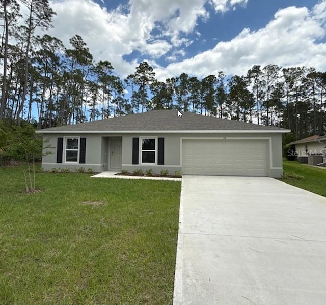 26 Postwood Dr, Palm Coast, FL 32164 - single story home featuring stucco siding, concrete driveway, a garage, and a front yard