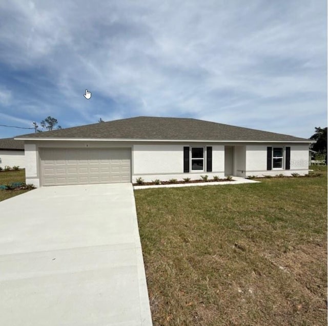 ranch-style house featuring concrete driveway, a garage, a front yard, and stucco siding