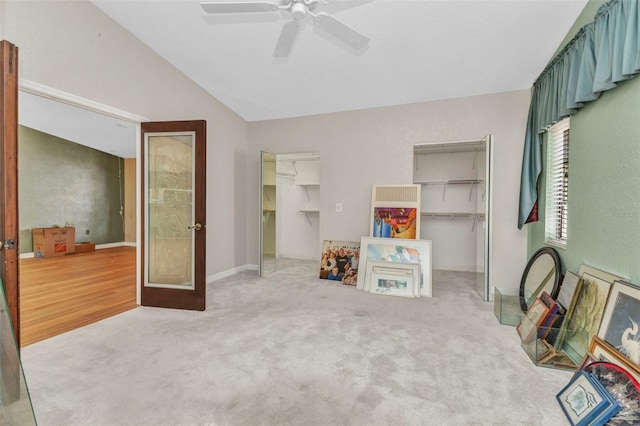 5046 San Rocco Ct, Punta Gorda, FL 33950 - game room with a ceiling fan, carpet, lofted ceiling, and baseboards