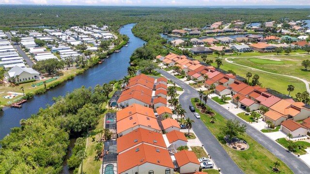 5046 San Rocco Ct, Punta Gorda, FL 33950 - aerial perspective of suburban area with a large body of water