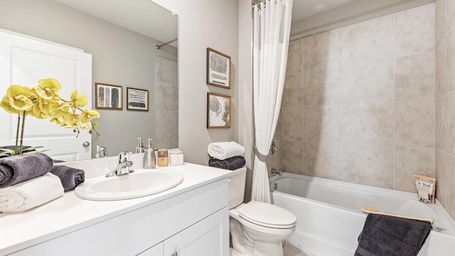 4967 Tuscola Blvd, North Port, FL 34287 - full bathroom with vanity, shower / tub combo with curtain, and toilet