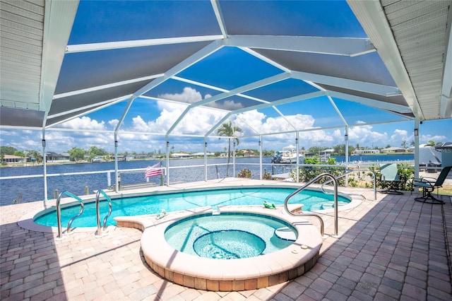 211 E Tarpon Blvd NW, Port Charlotte, FL 33952 - view of swimming pool featuring a patio area, a water view, and a lanai
