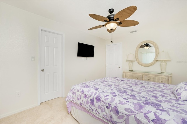 211 E Tarpon Blvd NW, Port Charlotte, FL 33952 - bedroom featuring light colored carpet and ceiling fan