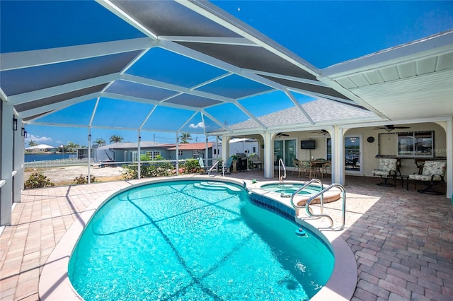 211 E Tarpon Blvd NW, Port Charlotte, FL 33952 - view of swimming pool with a patio, ceiling fan, glass enclosure, and a pool with connected hot tub
