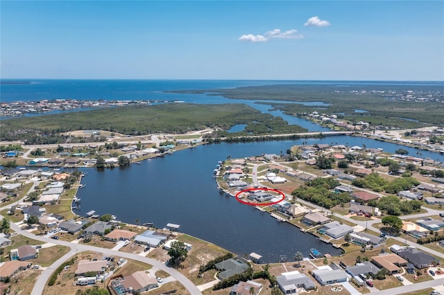 211 E Tarpon Blvd NW, Port Charlotte, FL 33952 - aerial overview of property's location with a large body of water and nearby suburban area