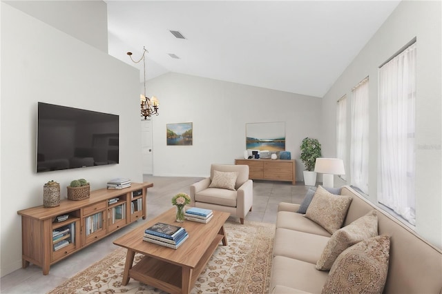 18111 Lake Worth Blvd, Port Charlotte, FL 33948 - living room with lofted ceiling, a chandelier, baseboards, and light tile patterned flooring