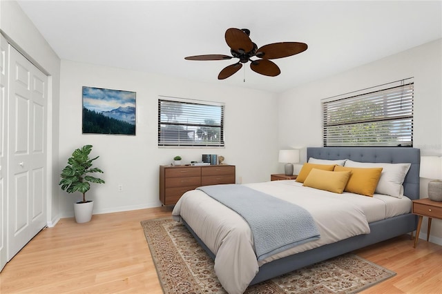 18111 Lake Worth Blvd, Port Charlotte, FL 33948 - bedroom featuring light wood finished floors, multiple windows, and ceiling fan