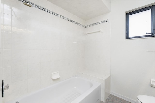 18111 Lake Worth Blvd, Port Charlotte, FL 33948 - bathroom featuring baseboards, washtub / shower combination, and toilet