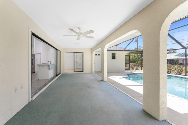 18111 Lake Worth Blvd, Port Charlotte, FL 33948 - outdoor pool with ceiling fan and arched walkways