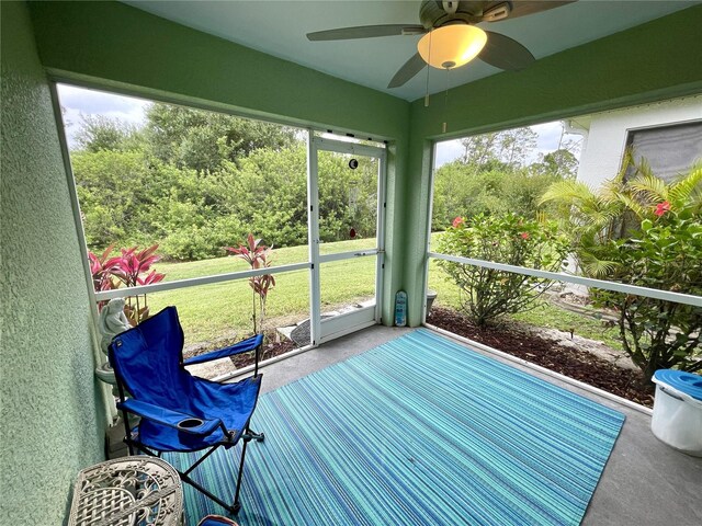 13170 SW Pembroke Cir N, Lake Suzy, FL 34269 - sunroom featuring ceiling fan