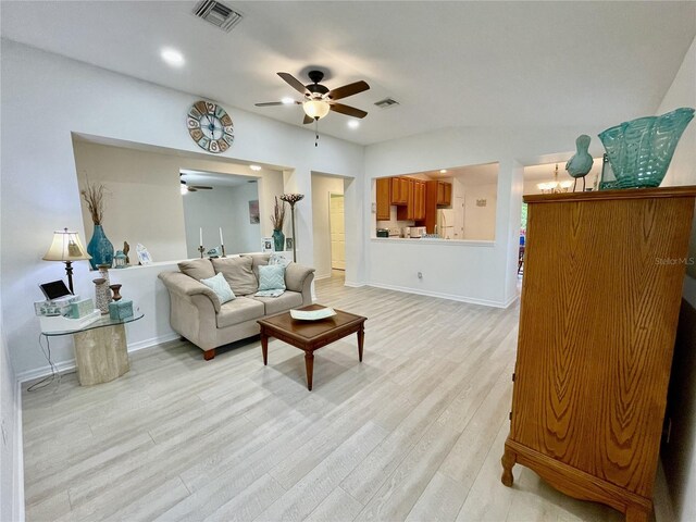 13170 SW Pembroke Cir N, Lake Suzy, FL 34269 - living area featuring ceiling fan, light wood-style flooring, baseboards, and recessed lighting