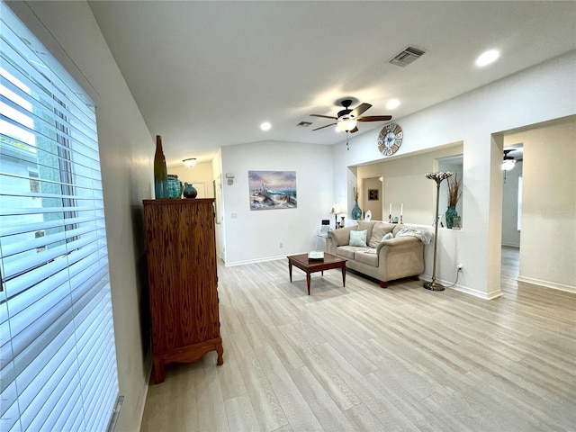 13170 SW Pembroke Cir N, Lake Suzy, FL 34269 - living room featuring baseboards, ceiling fan, light wood finished floors, and recessed lighting