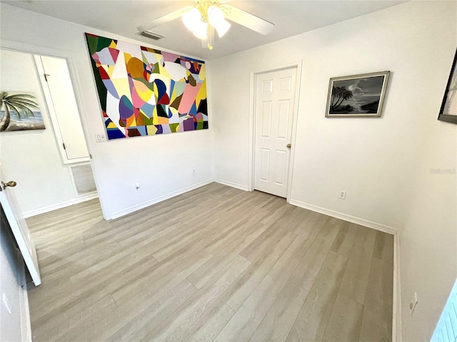 13170 SW Pembroke Cir N, Lake Suzy, FL 34269 - unfurnished room featuring ceiling fan, wood finished floors, and baseboards