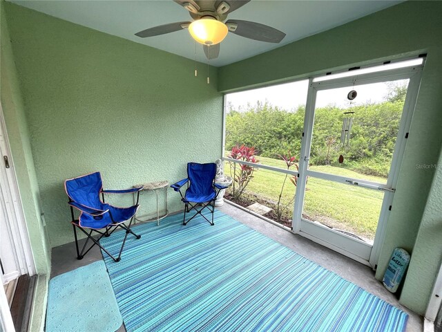 13170 SW Pembroke Cir N, Lake Suzy, FL 34269 - unfurnished sunroom with a ceiling fan