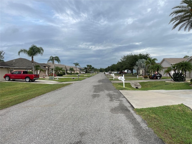 13170 SW Pembroke Cir N, Lake Suzy, FL 34269 - view of asphalt street featuring a residential view