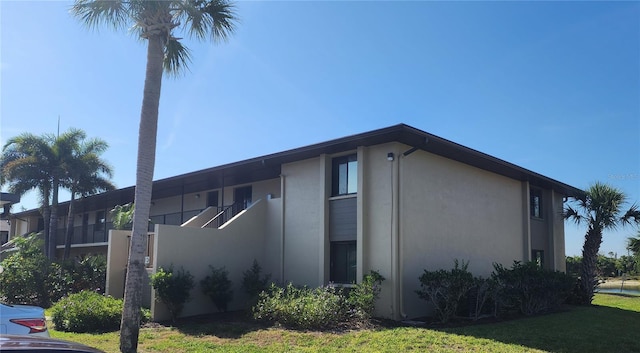 4056 Oakview Dr Unit E10, Port Charlotte, FL 33980 - view of side of property featuring stucco siding
