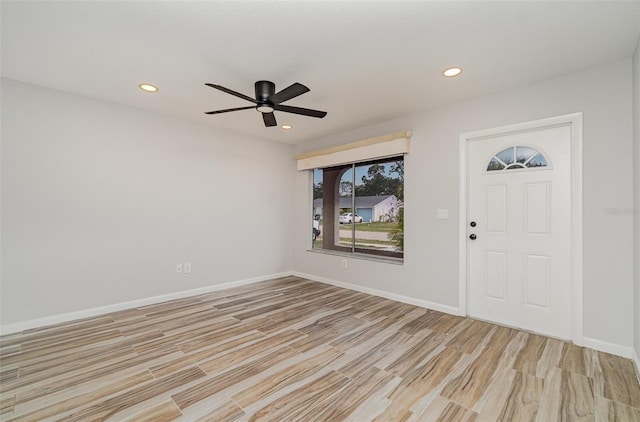 4282 Pocatella Ave, North Port, FL 34287 - entrance foyer featuring light wood finished floors, a ceiling fan, recessed lighting, and baseboards
