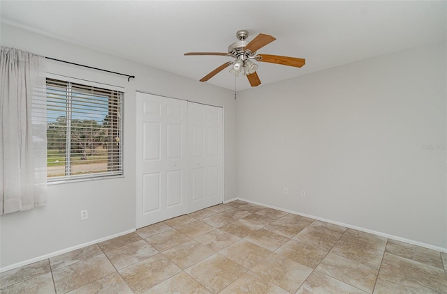 4282 Pocatella Ave, North Port, FL 34287 - unfurnished bedroom with baseboards, a closet, and ceiling fan