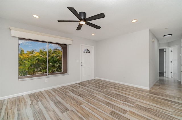 4282 Pocatella Ave, North Port, FL 34287 - empty room featuring ceiling fan, light wood-style flooring, recessed lighting, and baseboards