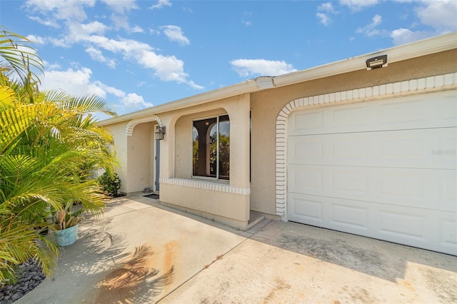 4282 Pocatella Ave, North Port, FL 34287 - view of property exterior with stucco siding and an attached garage