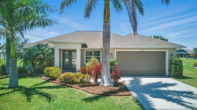 7505 Carissa, Punta Gorda, FL 33955 - single story home featuring french doors, stucco siding, a garage, a front yard, and concrete driveway