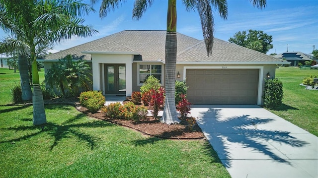 7505 Carissa, Punta Gorda, FL 33955 - ranch-style home featuring french doors, a garage, stucco siding, concrete driveway, and a front lawn