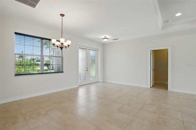 7505 Carissa, Punta Gorda, FL 33955 - empty room featuring a chandelier, baseboards, french doors, light tile patterned floors, and crown molding
