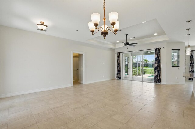 7505 Carissa, Punta Gorda, FL 33955 - spare room with a tray ceiling, a chandelier, a ceiling fan, recessed lighting, and baseboards