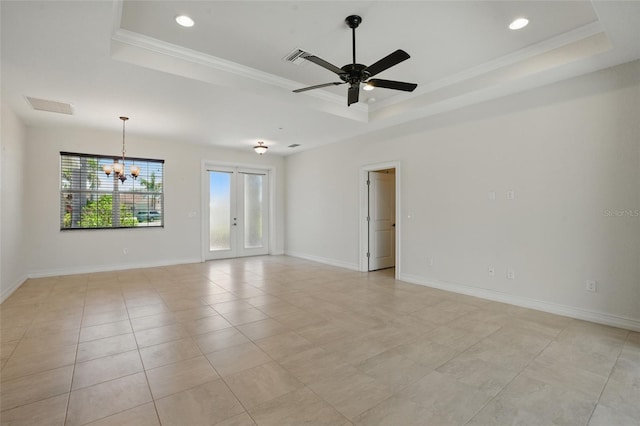 7505 Carissa, Punta Gorda, FL 33955 - empty room with a tray ceiling, a chandelier, recessed lighting, ceiling fan, and ornamental molding