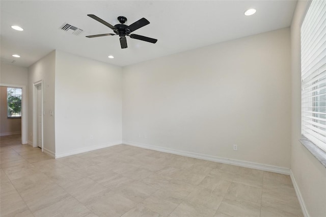 7505 Carissa, Punta Gorda, FL 33955 - spare room featuring a ceiling fan, recessed lighting, and baseboards